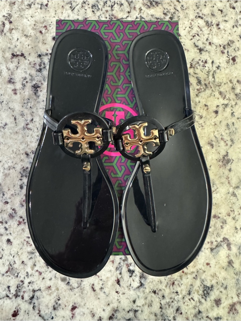 Tory Burch Black Jelly Thong Sandals with Gold Logo Medallion